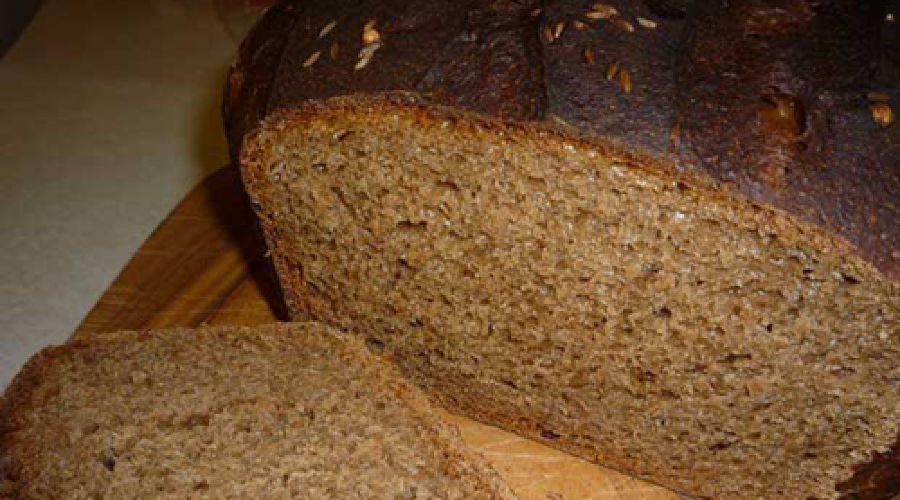 Ржаной хлеб без дрожжей в хлебопечке рецепт. Ржаной хлеб. Литовский ржаной хлеб. Литовский хлеб на закваске. Черный хлеб на закваске.