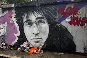 Граффити с Виктором Цоем на улице Чапаева &copy;&nbsp;Фото Ангелины Трофименко, Юга.ру