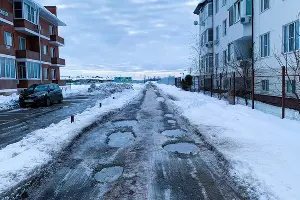 На фото выезд из поселка Российского в коттеджный поселок Комарово &copy;&nbsp;Фото Никиты Зырянова, Юга.ру