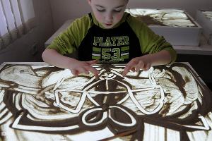 Песочная арт-терапия для детей-аутистов © Елена Синеок. ЮГА.ру