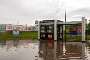 Последствия ливня на улице Московской &copy;&nbsp;Фото Дмитрия Пославского, Юга.ру