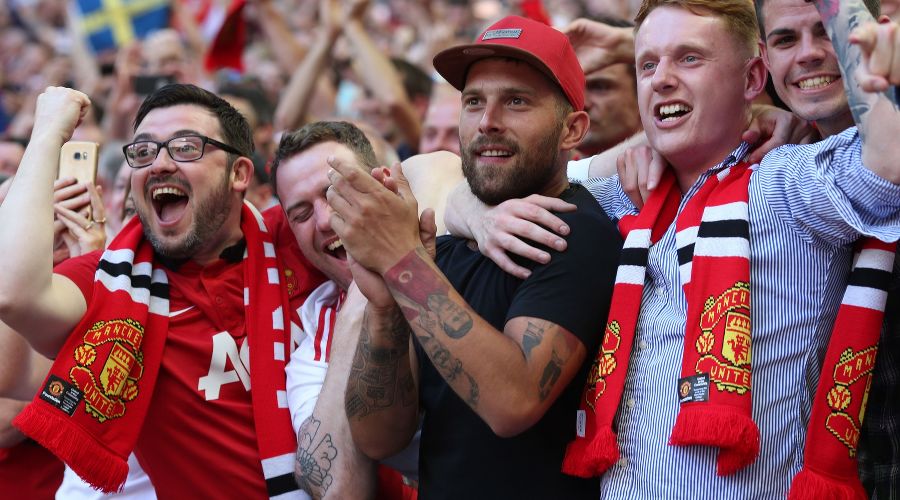 Болельщики ФК «Манчестер Юнайтед» © Фото с официального сайта ФК «Манчестер Юнайтед», manutd.com